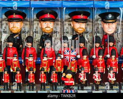 Prince Harry & Prince William models. The Royal Family - Prince William and Prince Harry toys and souvenirs for sale in a London Souvenir Shop Stock Photo