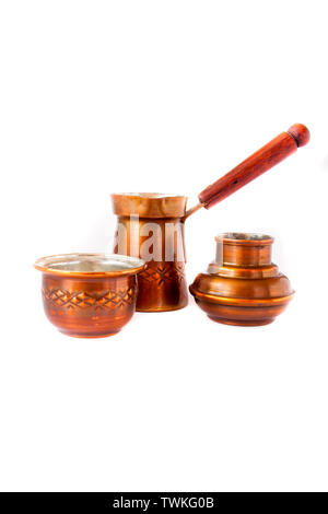 Handmade copper coffee service on a white background Stock Photo