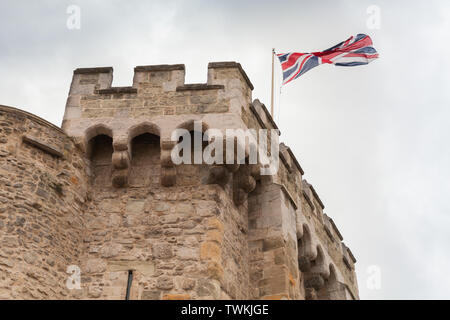 British flag is on the Bargate. It is a medieval gatehouse in the city of Southampton, England. Constructed in Norman times as part of the Southampton Stock Photo