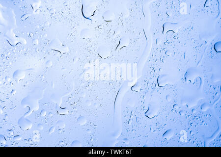 Picture Inside water rain drops on car window glass Stock Photo