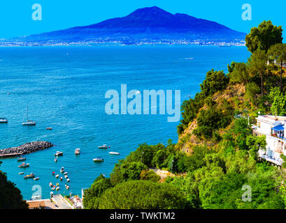 Breathtaking view from the Sorrento coast, in the background the imposing presence of the volcano Vesuvius. Vico Equense, Naples - Italy Stock Photo