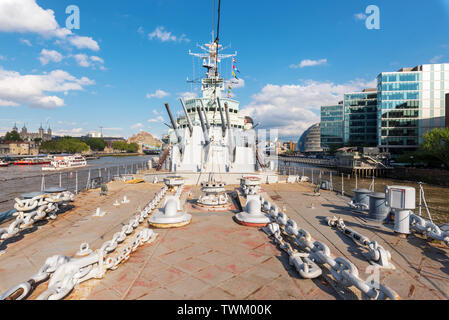 London, United Kingdom - May 13, 2019: View of HMS Belfast Royal Navy light cruise - warship Museum in London. Belfast moored in London on River Thames and operated by the Imperial War Museum . Stock Photo
