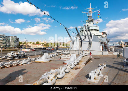 London, United Kingdom - May 13, 2019: View of HMS Belfast Royal Navy light cruise - warship Museum in London. Belfast moored in London on River Thames and operated by the Imperial War Museum . Stock Photo