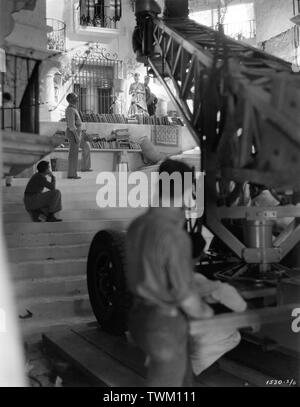 MARLENE DIETRICH as Concha Perez LIONEL ATWILL  in THE DEVIL IS A WOMAN 1935 director Josef von STERNBERG on set candid filming costume by TRAVIS BANTON photo DON ENGLISH Paramount Pictures Stock Photo