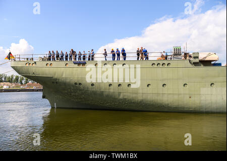 Bremerhaven, Germany. 21st June, 2019. The naval training sailing ship 'Gorch Fock' is undocked from a dock of the Bredo shipyard. The naval training ship 'Gorch Fock' is being launched in Bremerhaven today after more than three years in the dock. Credit: Mohssen Assanimoghaddam/dpa/Alamy Live News Stock Photo