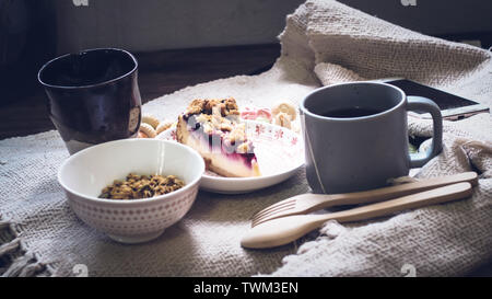 Healthy morning meal. Greek yogurt, cereal and kiwi fruit in a glass. Healthy breakfast and dietary food. Loss weight meal. Stock Photo