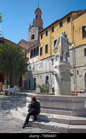Well in honour of Siro Andrea Carli, behind the San Siro cathedral, historical center La Pigna, old town of San Remo, Liguria, Italy Stock Photo