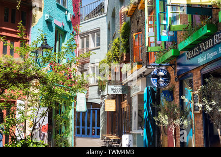 London, United Kingdom - May 14, 2019 : Neals Yard is a small alley with colorful buildings in Covent Garden district, London, United Kingdom . Stock Photo