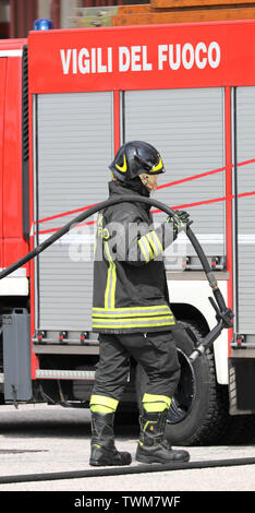 Veneto, Italy. Firemen. Firemen in action Stock Photo - Alamy
