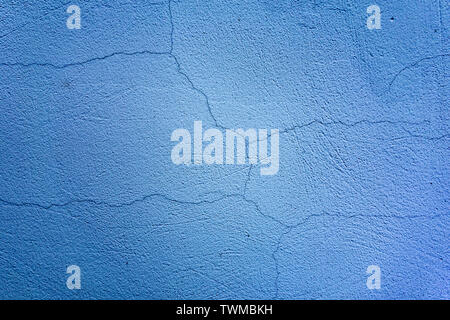 Blue cracked texture surface background. Copy space or backdrop for design projects Stock Photo