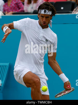 London, UK. 21st June, 2019. LONDON, ENGLAND - JUNE 21: Feliciano Lopez (ESP) against Milos Raonic (CAN) during Day 5 of the Fever-Tree Championships at Queens Club on June 21, 2019 in London, United Kingdom. Credit: Action Foto Sport/Alamy Live News Stock Photo