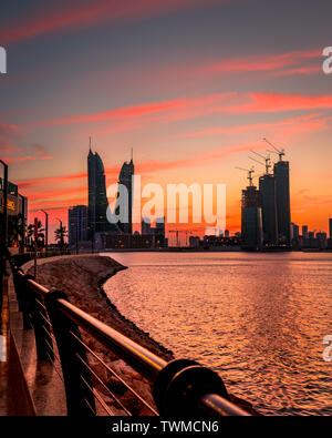 Sunset view of Bahrain Bay with Bahrain skyline Stock Photo