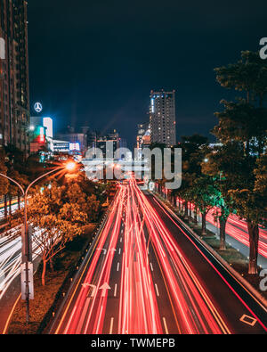 Long Exposure of car trails in the city Stock Photo