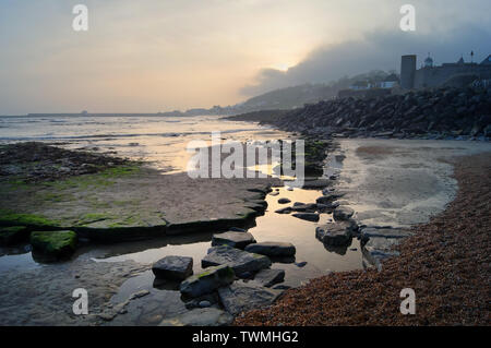 UK,Dorset,Lyme Regis,Church Beach Sunset Stock Photo