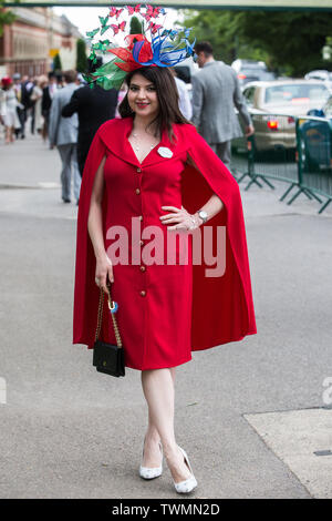 A racegoer attends Ladies Day at Royal Ascot on June 17, 2010 Stock ...