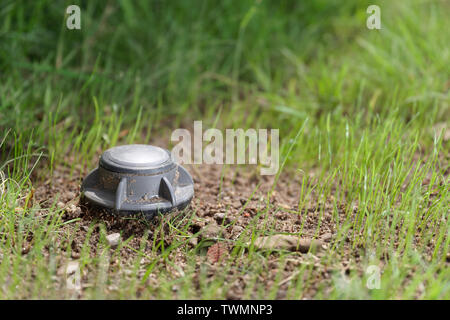 Closeup of an up sprinkler in a green lawn. Hamburg, Germany Stock Photo