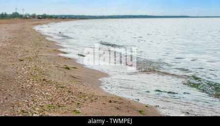The coastline of the Azov sea in the Crimea. Selective focus. Stock Photo