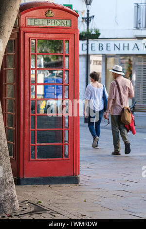 Telephone boxes designed in UK by Sir Giles Gilbert Scott still in use in Gibraltar where they are a tourist attraction with British connection Stock Photo