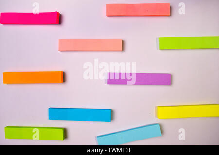 Collection of different colored sheets of note papers isolated on white background Stock Photo