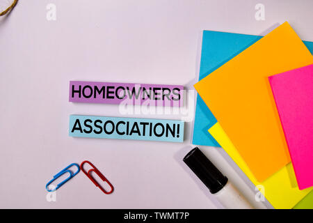 Homeowners Association! on sticky notes isolated on white background. Stock Photo