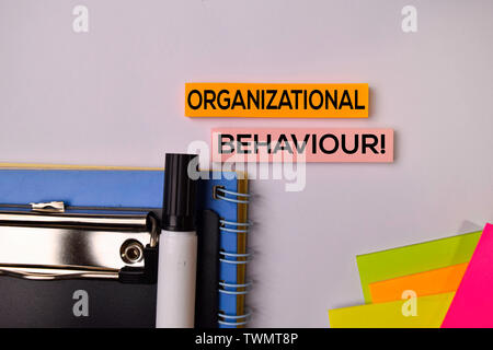 Organizational Behaviour! on sticky notes isolated on white background. Stock Photo