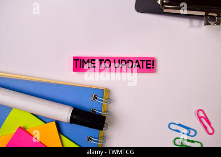Time To Update! on sticky notes isolated on white background. Stock Photo