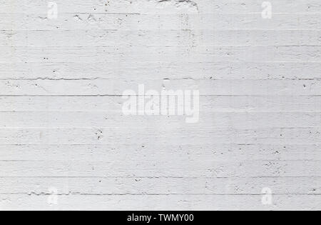 High resolution full frame texture background of a plastered, painted, uneven and a bit dirty white concrete wall. Stock Photo