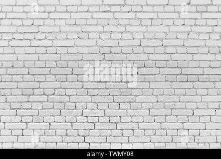 High resolution full frame background of detailed old brick wall in black and white. Stock Photo