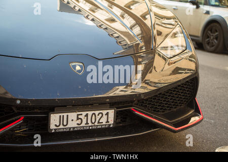 Paris, France - July 06, 2018: Black Lamborghini parked near the hotel on the central streets of Paris Stock Photo