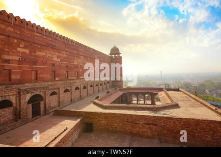 Fatehpur Sikri red sandstone fort wall with aerial view of Fatehpur Sikri cityscape at Agra, India Stock Photo