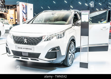 Paris, France, Oct 2018 metallic white new electric plug in hybrid Peugeot 3008 II Hybrid4, Mondial Paris Motor Show, 2nd gen car produced by Peugeot Stock Photo