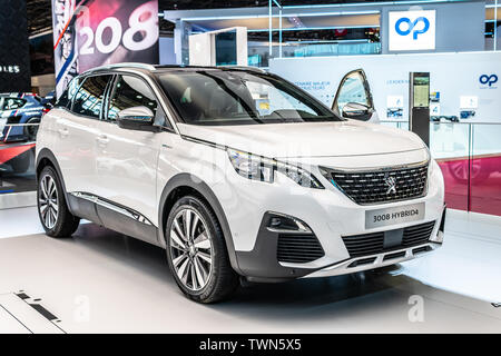 Paris, France, Oct 2018 metallic white new electric plug in hybrid Peugeot 3008 II Hybrid4, Mondial Paris Motor Show, 2nd gen car produced by Peugeot Stock Photo