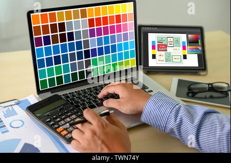 Creative Designer Graphic at work. , Illustrator Graphic designer working digital tablet and computer Color swatch samples Stock Photo