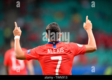 Salvador, Brazil. 21st June, 2019. Chile's Alexis Sanchez celebrates after scoring during the Group C match between Chile and Ecuador at the Copa America 2019, held in Salvador, Brazil, June 21, 2019. Credit: Xin Yuewei/Xinhua/Alamy Live News Stock Photo