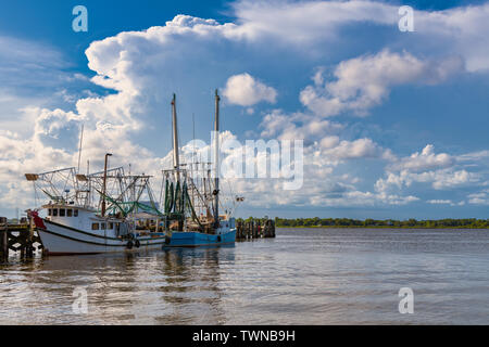 Docked shrimp boats in Biloxi Bay, Mississippi Stock Photo
