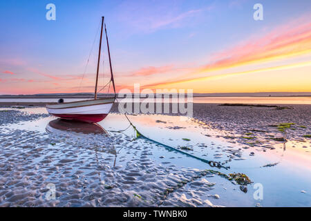Appledore, North Devon, England. Saturday 22nd June 2019. UK Weather. After a chilly night in North Devon, dawn sees a colourful sunrise over the small boats moored on the River Torridge estuary at Appledore. Credit: Terry Mathews/Alamy Live News Stock Photo