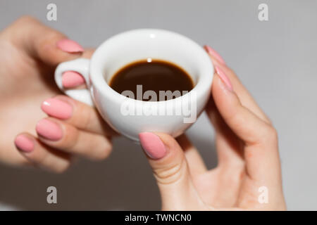 Taking the neapolitan coffee in ceramic cup Stock Photo