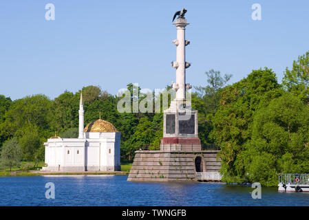 SAINT-PETERSBURG, RUSSIA - MAY 29, 2018: The Chesme Column and the Turkish Bath Pavilion on a sunny May day. Catherine Park, Tsarskoe Selo Stock Photo