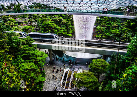 Singapore - Jun 11,  2019: HSBC Rain Vortex. Jewel Changi Airport is a mixed-use development at Changi Airport in Singapore, opened in April 2019. Stock Photo