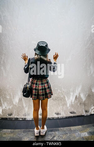 Singapore - Jun 11,  2019: Bottom of waterall. Jewel Changi Airport is a mixed-use development at Changi Airport in Singapore, opened in April 2019. Stock Photo