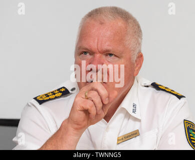 Dresden, Germany. 21st June, 2019. Horst Kretzschmar, president of the state police of Saxony, sits on the podium during the presentation of the new Messenger app, MePol app, to the police in Saxony. Credit: Robert Michael/dpa-Zentralbild/dpa/Alamy Live News Stock Photo