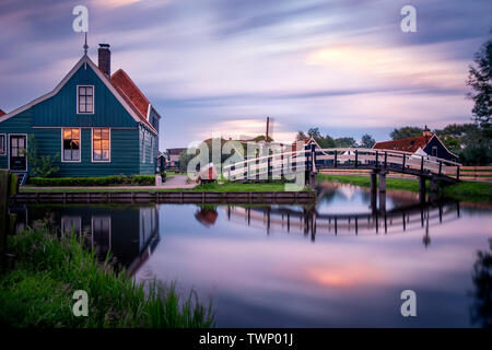 Windy and cloudy sunset in Zaanse Schans, Zaandam, Amsterdam, Holland Stock Photo