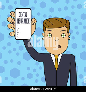 Writing note showing Dental Insurance. Business concept for form of health designed to pay portion or full of costs Man Holding Vertical Smartphone De Stock Photo