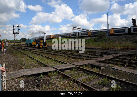 Tyseley, Birmingham, UK. 22nd June 2019.  The official replica of Stephenson’s famous Rocket on display and running at the Tyseley locomotive works open weekend. Rocket was built for the The Rainhill Trials in October 1829 for the then nearly-completed Liverpool and Manchester Railway and was the only locomotive to complete the trials. G.P. Essex/Alamy Live News Stock Photo