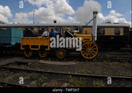 Tyseley, Birmingham, UK. 22nd June 2019.  The official replica of Stephenson’s famous Rocket on display and running at the Tyseley locomotive works open weekend. Rocket was built for the The Rainhill Trials in October 1829 for the then nearly-completed Liverpool and Manchester Railway and was the only locomotive to complete the trials. G.P. Essex/Alamy Live News Stock Photo