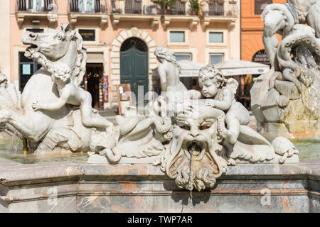 Sculpture of cupids, walruse and horse. Detail of The Fountain of Neptune (Italian: Fontana del Nettuno) in Navona Square, Rome, Italy.