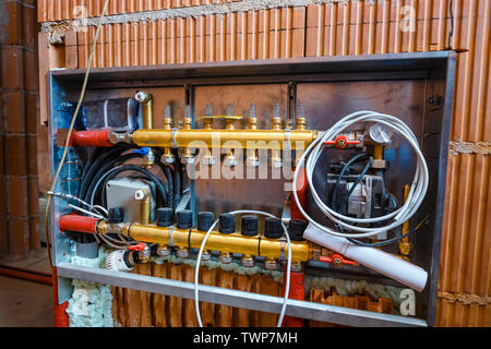 Close up on water floor heating system interior Stock Photo