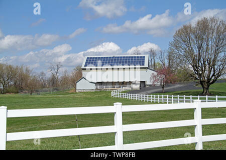 Solar panels on the roof of barn in rural Pennsylvania, USA Stock Photo