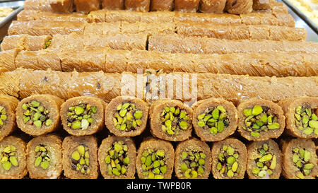 Bourma with pistachios. Lebanese sweets. Lebanese cuisine. Sidon, Lebanon - June, 2019 Stock Photo