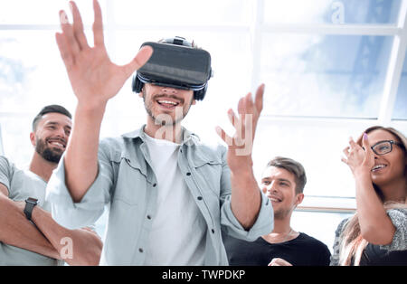Indoors close up shot of men wearing virtual reality glasses Stock Photo